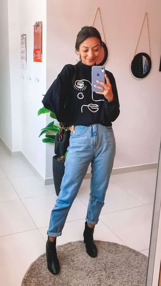 look para ir ao shopping no frio com calca jeans e bota preta