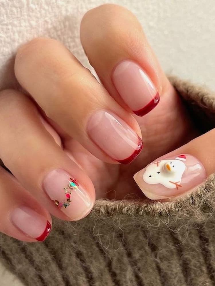 ideias de unhas para o Natal com inglesinha vermelha 