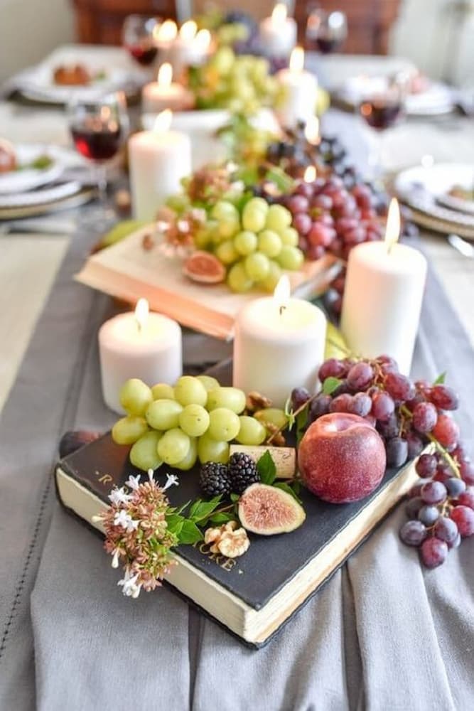 velas e frutas para decoração de mesa de natal 